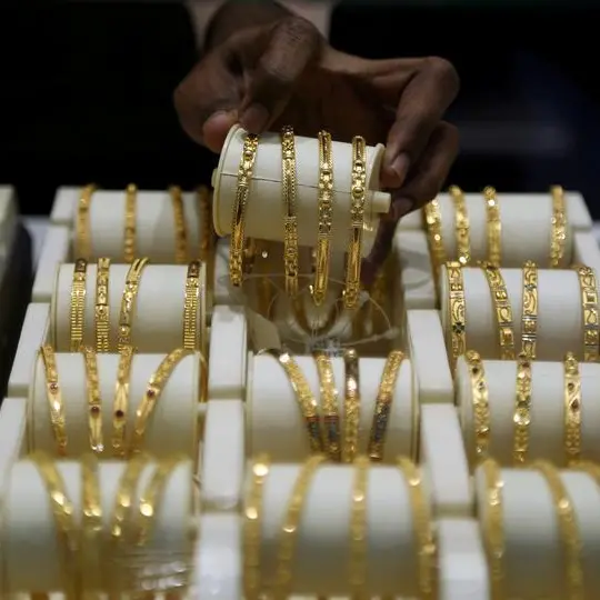 Gold ticks higher as soft US data lifts Fed rate cut bets