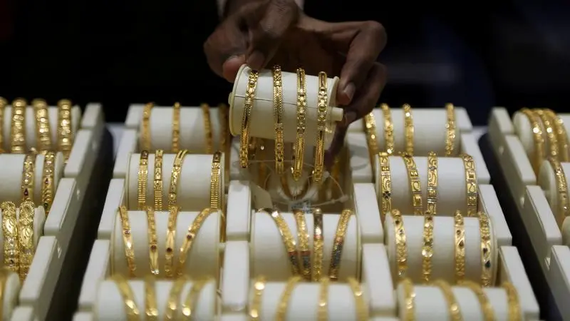 Gold hits near 3-week peak on rate cut bets, end to US shutdown