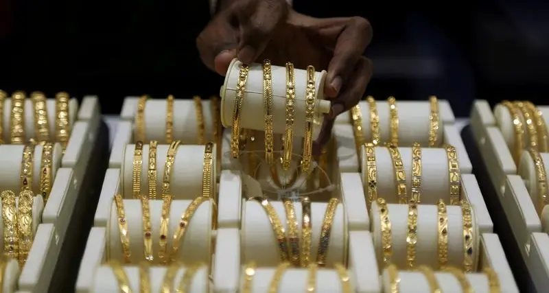 Gold hits near 3-week peak on rate cut bets, end to US shutdown