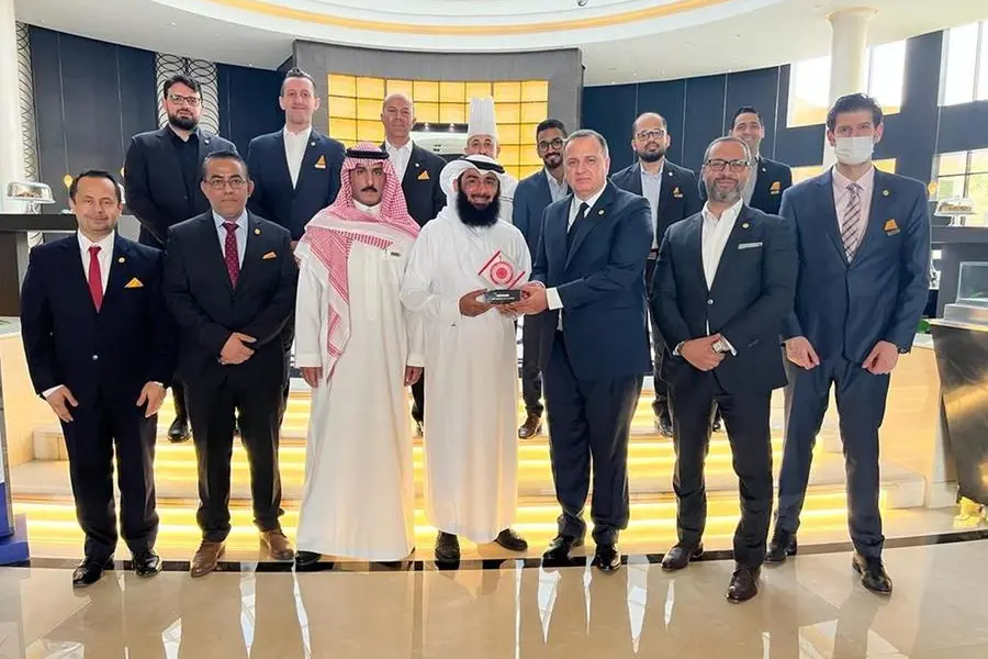 voco Riyadh representatives receiving the award