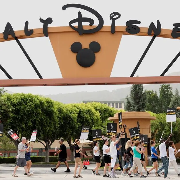Disney reports shrinking TV business, shares tumble