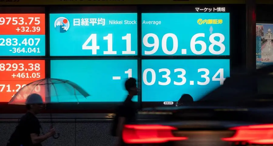 Asian stocks slide on rising trade tensions, yen climbs