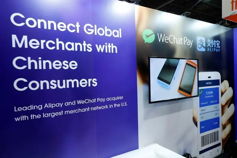A display at the Citron booth promotes WeChat Pay and Alipay during the Money 20/20 conference in Las Vegas, Nevada, U.S. on October 24, 2017. REUTERS/Steve Marcus , Reuters Images