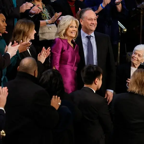 'Smooch of the Union': US first lady steals show with wayward kiss