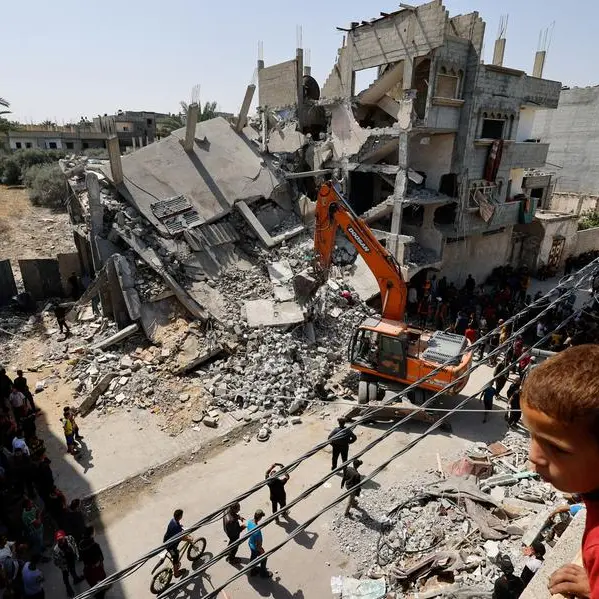 In Gaza, Palestinians risk death in desperate rush for aid