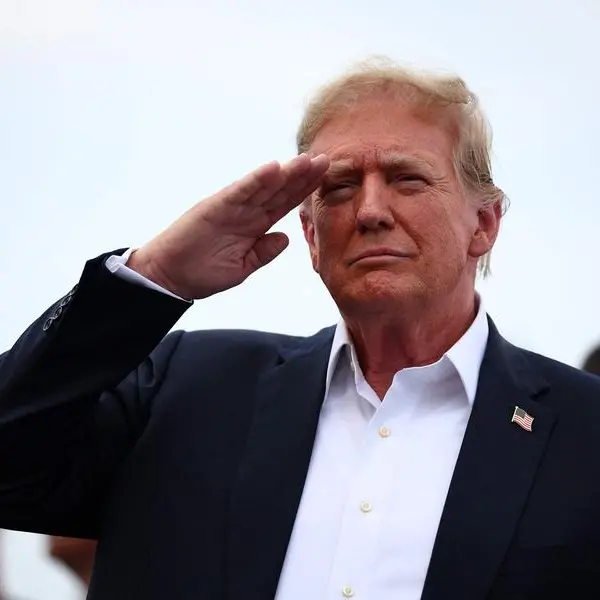 As US remembers fallen soldiers, Trump calls opponents 'scum'