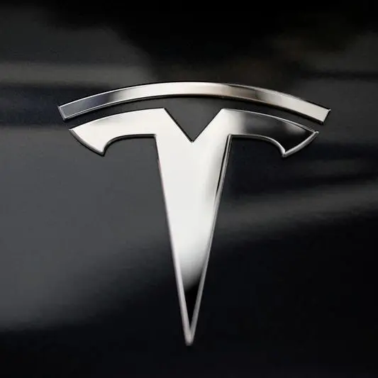 Tesla ready to invest up to $2bln to build India factory, but with riders -ET