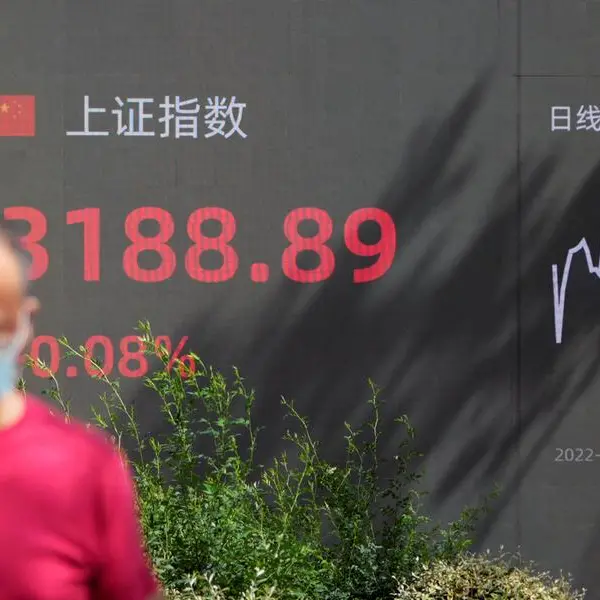 China stocks slump to near 5-year low; Moody's changes outlook to negative