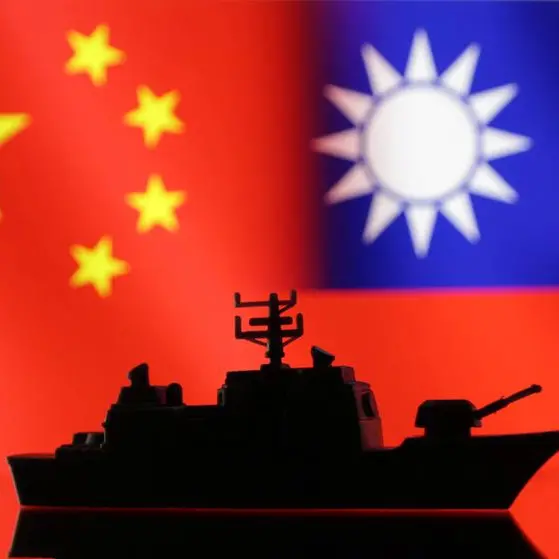 Taiwan warns of 'enormous' Chinese bases near its S.China Sea holding