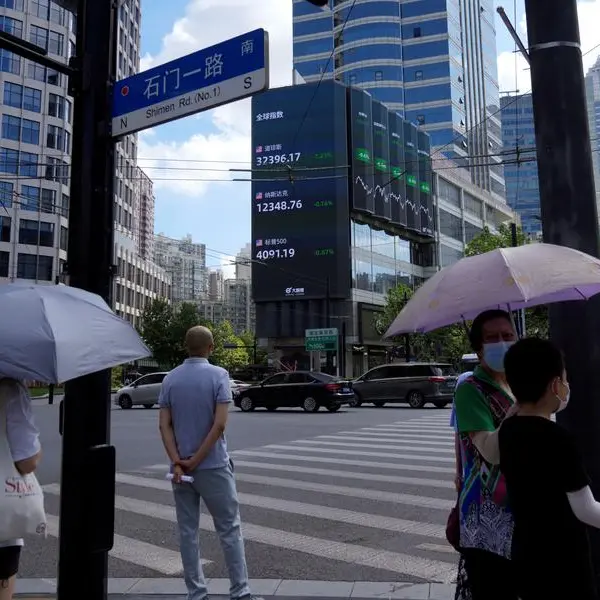 Asian shares extend global rally; oil prices jump on Saudi cuts