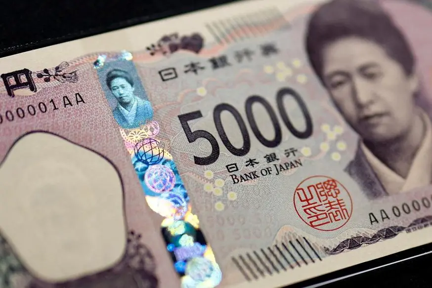 Holograms, which show different images and colours depending on the angle at which they are viewed, are seen on the new Japanese 5,000 yen banknote as the new note is displayed at a currency museum of the Bank of Japan, on the day the new notes of 10,000 yen, 5,000 yen and 1,000 yen went into circulation, in Tokyo, Japan July 3, 2024. REUTERS/Issei Kato/Pool REFILE - CORRECTING DENOMINATION FROM \"10,000\" TO \"5,000\". , Reuters/REUTERS
