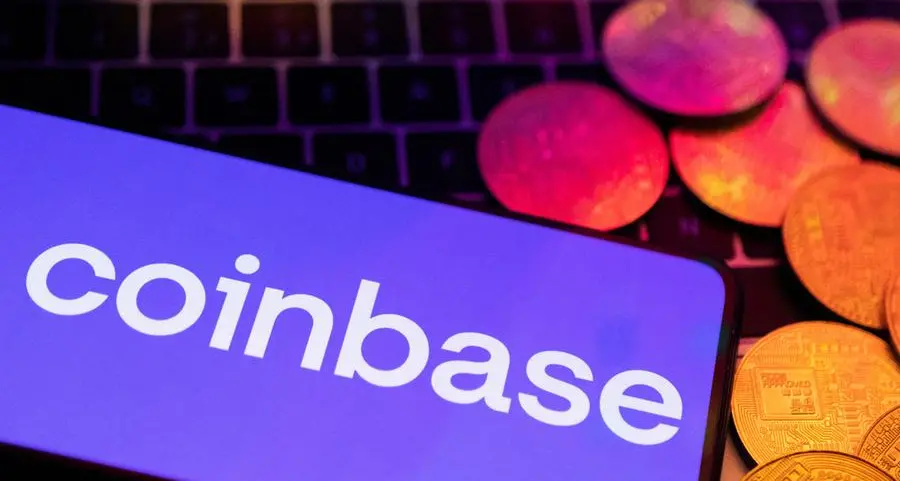 Coinbase shares surge after bitcoin ETF euphoria helps return to profitability