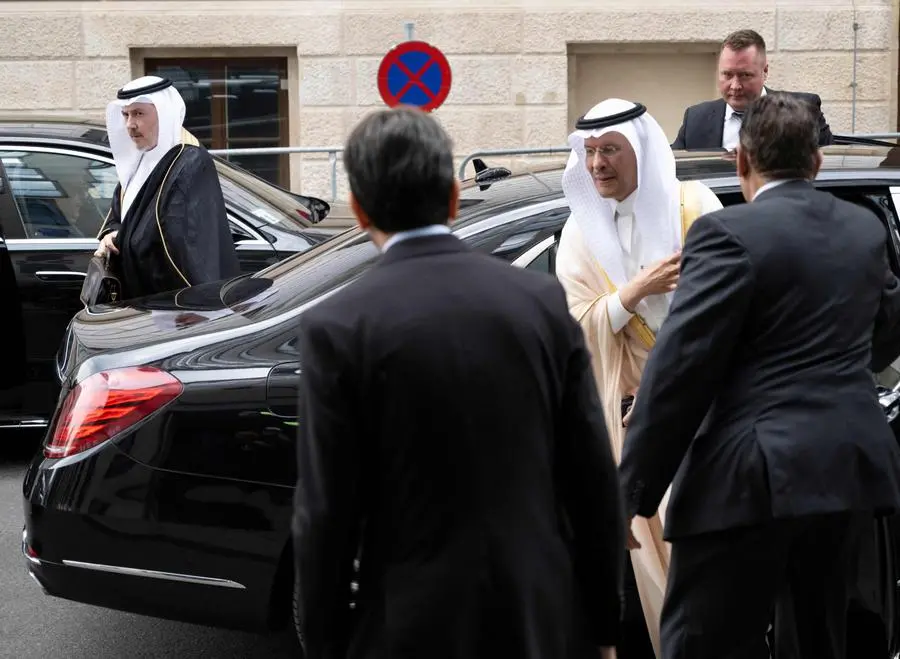 Saudi Minister of Energy Prince Abdulaziz bin Salman al-Saud (L) arrives for the 35th OPEC (Organization OF Petroleum Exporting Countries) and non-OPEC ministerial meeting in Vienna, Austria, on June 4,2023. Opec+ ministers meet to try to find a solution to the slump in oil prices, with the possibility of a further production cut on the horizon, against a backdrop of tensions between Moscow and Riyadh. (Photo by JOE KLAMAR / AFP)