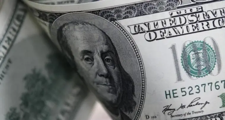 Dollar boosted by rate expectations, safe-haven flows as Trump, Xi meet
