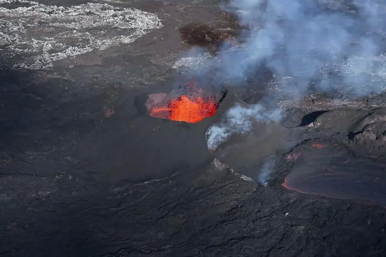 Iceland volcano still spewing lava, one month on