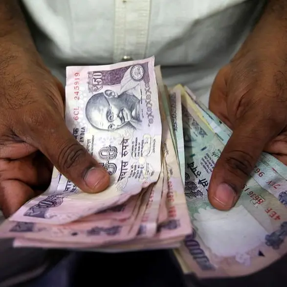 Indian rupee edges lower but exporters' dollar sales likely to limit downside