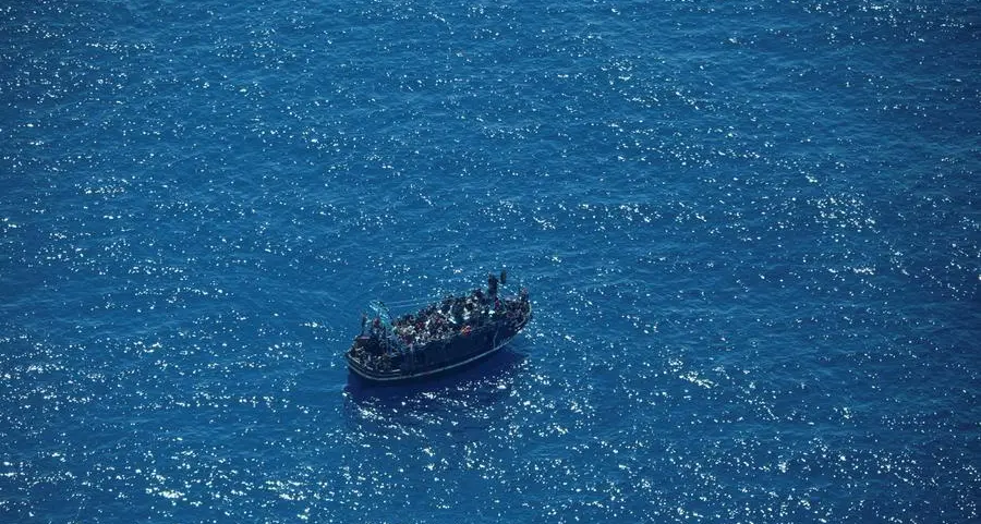 Boat with 400 migrants adrift between Greece and Malta, support service says