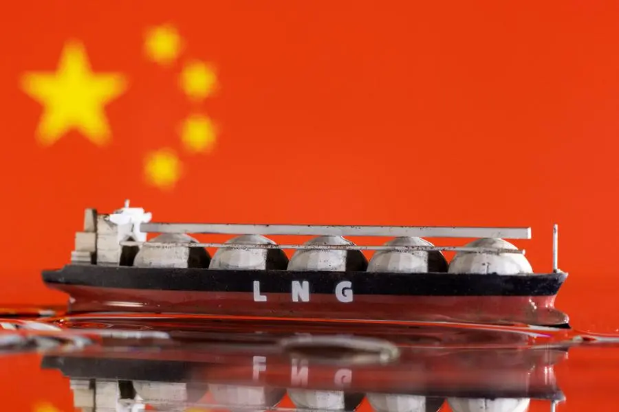 FILE PHOTO: Model of LNG tanker is seen in front of China\\'s flag in this illustration taken May 19, 2022. REUTERS/Dado Ruvic/Illustration. , Reuters