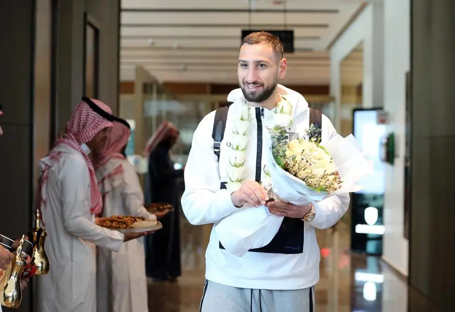 Soccer Football - Paris St Germain arrive in Riyadh ahead of their friendly match v Saudi Pro League XI - King Khalid International Airport, Riyadh, Saudia Arabia - January 19, 2023 Paris St Germain's Gianluigi Donnarumma arrives in Saudia Arabia ahead of the match REUTERS/Ahmed Yosri