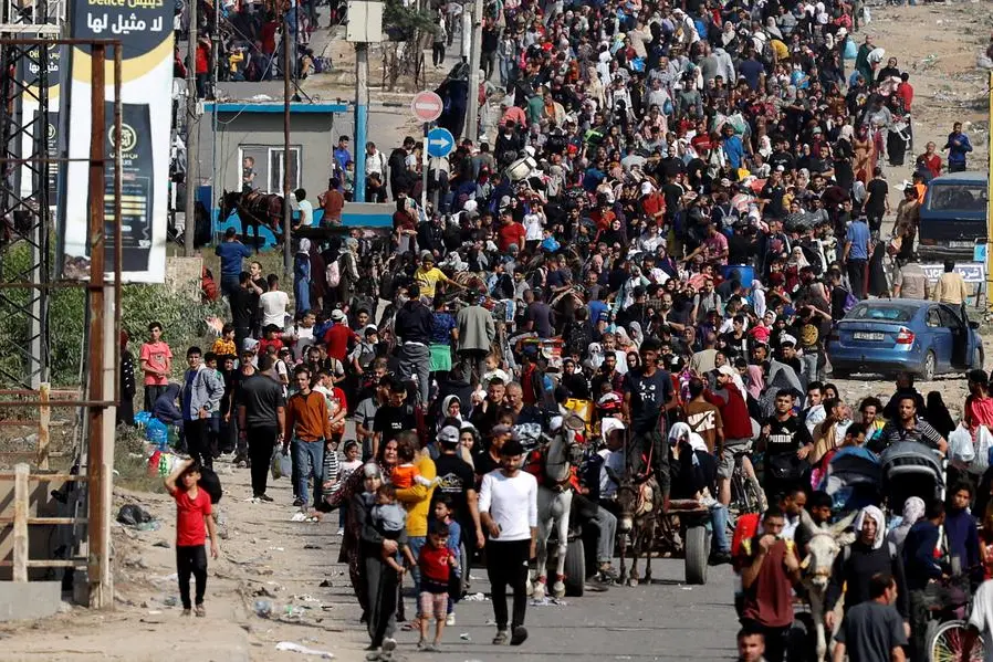 Palestinians fleeing north Gaza walk towards the south, amid the ongoing conflict between Israel and Palestinian Islamist group Hamas, in the central Gaza Strip, November 9, 2023. REUTERS/Mohammed Salem , Reuters