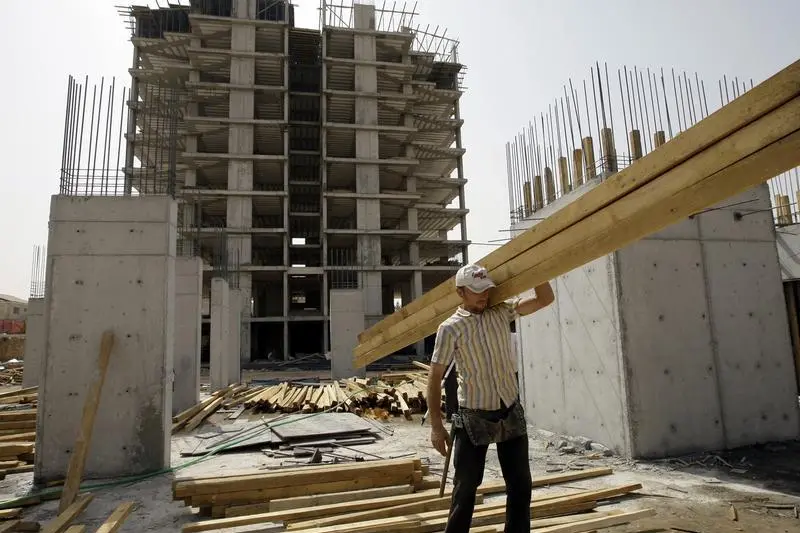 Image used for illustrative purpose. A man works at a construction site in Iraq\\'s northern province of Arbil September 25, 2010. , Reuters Images/Azad Lashkari