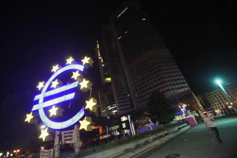 A sculpture showing the Euro currency sign is seen in front of the European Central Bank (ECB) headquarters in Frankfurt June 29, 2012. , Reuters Images/Alex Domanski