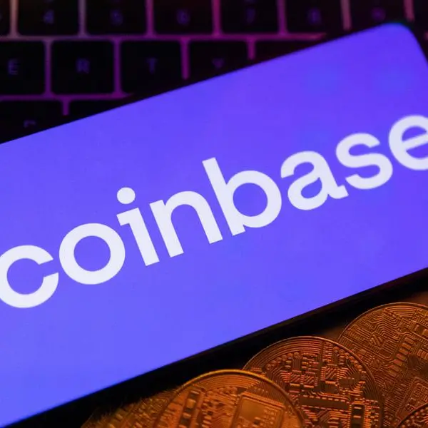 Coinbase shares near two-year high as ETF euphoria boosts trading volume