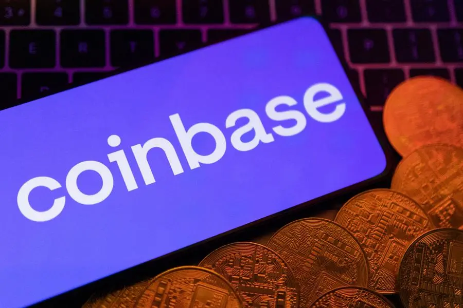 Coinbase shares near two-year high as ETF euphoria boosts trading volume