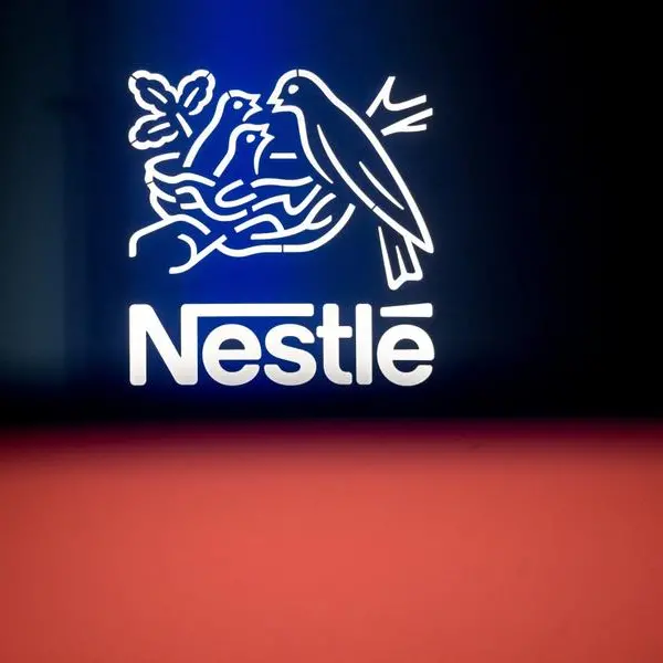 Nestle cuts sales forecast as price rises slow