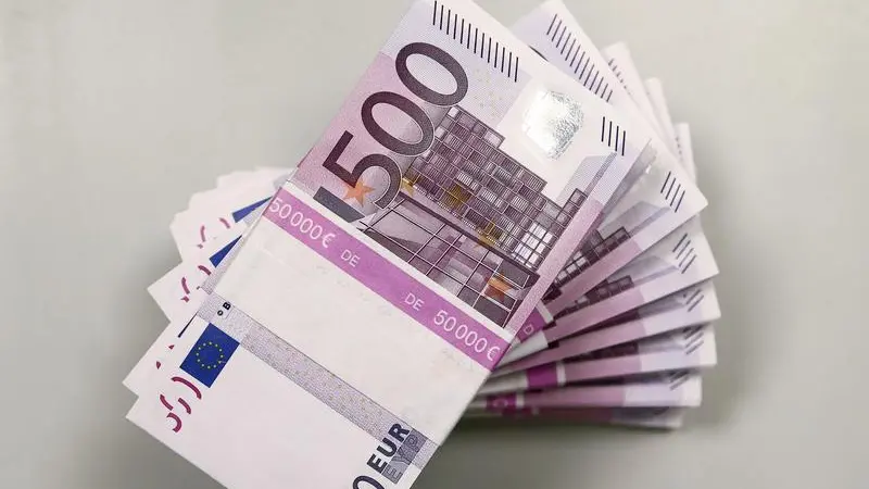 Euro zone bond yields edge up on first trading day of new year