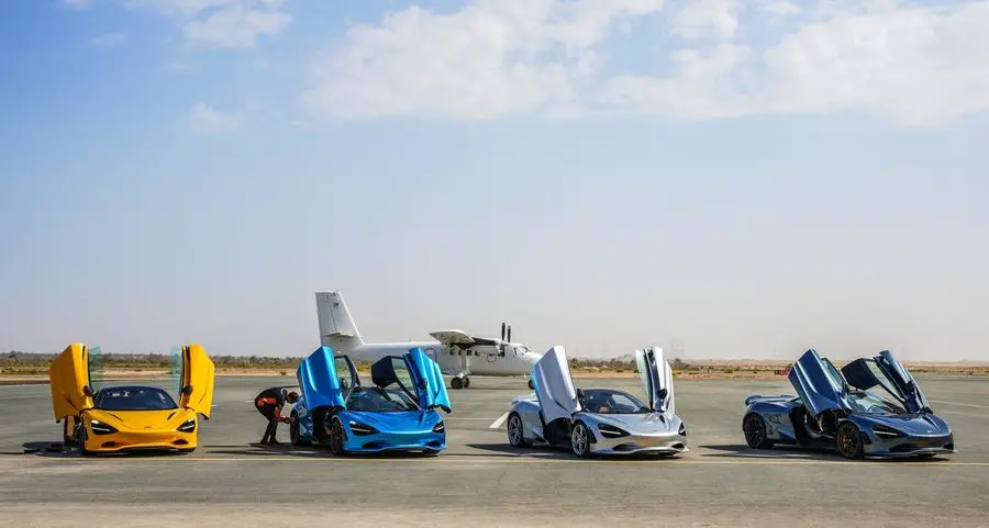 Supercar lovers, skydivers and race-winning McLaren drivers take to the runway in Abu Dhabi