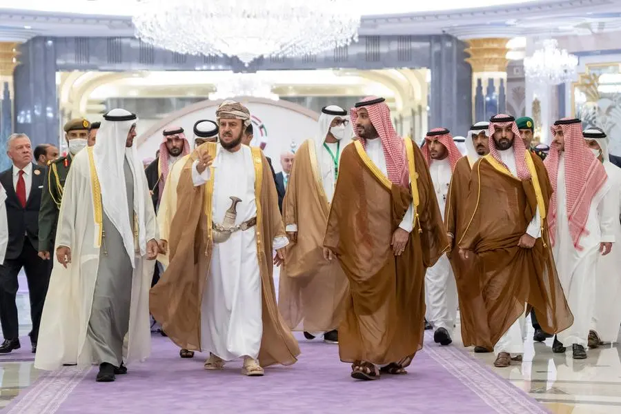 JEDDAH, SAUDI ARABIA - July 16, 2022: HH Sheikh Mohamed bin Zayed Al Nahyan, President of the United Arab Emirates (L) attends the Jeddah Security and Development Summit, at King Abdullah International Convention Center. Seen with HH Asa\\'ad bin Tariq Al Said, Omani Deputy Prime Minister for Relations and International Cooperation Affairs and Personal Representative of the Sultan of Oman (2nd L) and HRH Prince Mohamed bin Salman bin Abdulaziz Al Saud, Crown Prince, Deputy Prime Minister and Minister of Defense of Saudi Arabia (R). ( Rashed Al Mansoori / Presidential Court ) ---