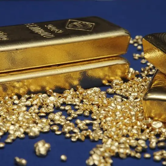 Gold set for weekly gain as weak dollar, Middle East woes lift appeal