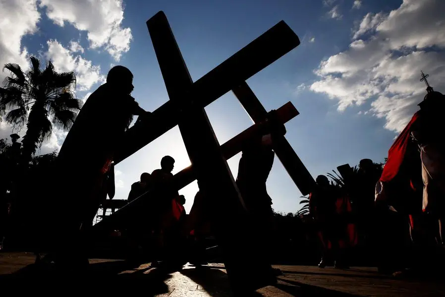 People take part in a performance of \"The Passion of Jesus\" on Good Friday in San Pedro Tlaquepaque, Mexico on April 7, 2023. (Photo by ULISES RUIZ / AFP) , Agence France-Presse (AFP)/AFP