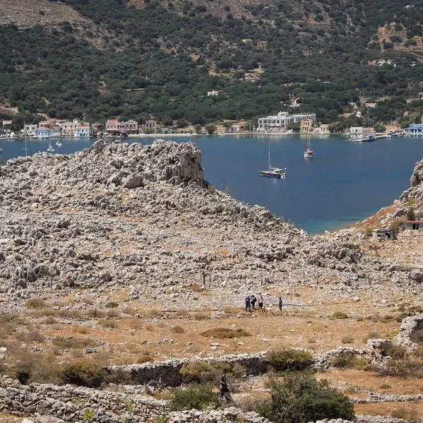 Body found on Greek island where UK journalist went missing: police