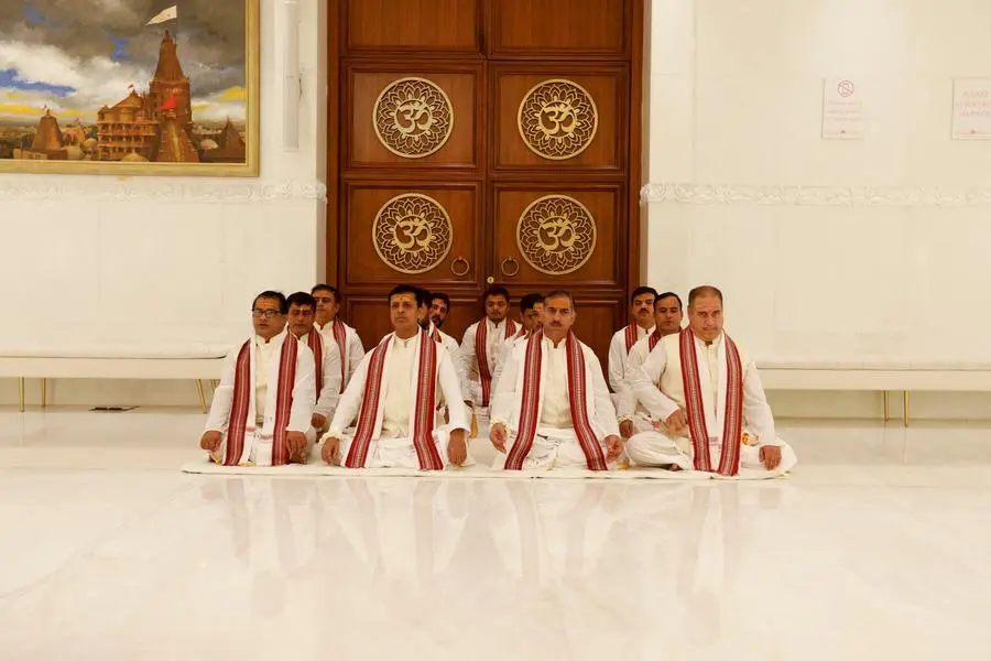 Priests pray during the inauguration of Hindu Temple in Dubai, United Arab Emirates, October 4, 2022. REUTERS/Rula Rouhana