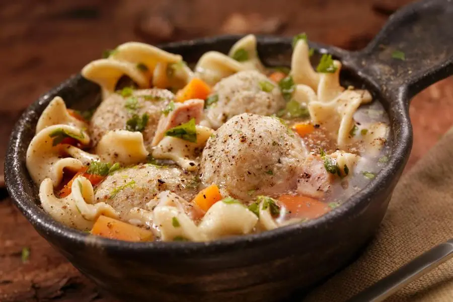 A classic favourite! Fluffy matzo balls floating in roasted chicken noodle soup.- Photographed on Hasselblad H3D2-39mb Camera , Getty Images/Getty Images