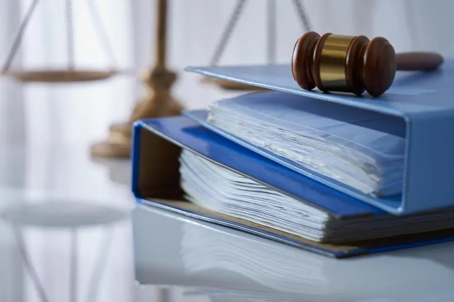 gavel hammer on stack of document libra scale as background. Image Courtesy: Getty Images , Getty Images/500px