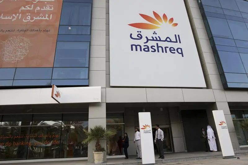 People walk out of a branch of Mashreq bank at Dubai Internet City in Dubai. Nikhil Monteiro, Reuters , Reuters Images