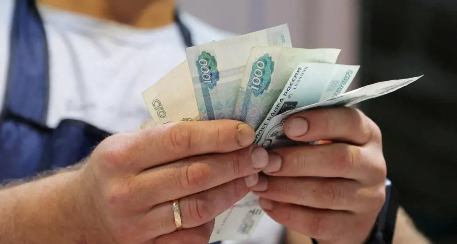 Russian rouble edges lower as authorities discuss currency controls