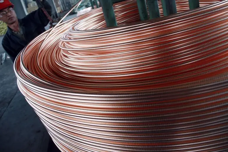 Image used for illustrative purpose. An employee unloads copper at a factory in Nantong, Jiangsu province, June 18, 2011. China Daily, Reuters , Reuters Images
