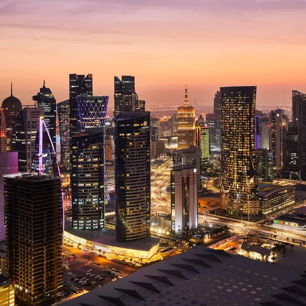 Buildings lit in Qatar colour in display of unity amid tensions