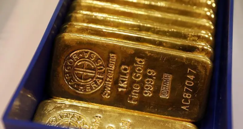 Gold heads for weekly fall as fewer Fed rate cut prospects weigh