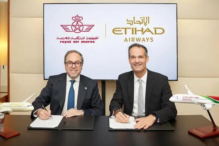 <p>Abdelhamid Addou, Chairman and Chief Executive Officer of Royal Air Maroc and Antonoaldo Neves, Chief Executive Officer of Etihad Airways sign MoU</p>\\n