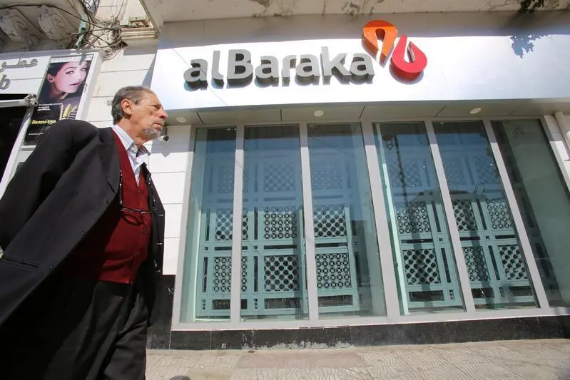 A man walks past a branch of Al Baraka Bank in Algiers city, Algeria April 5, 2017. Ramzi Boudina Reuters Images