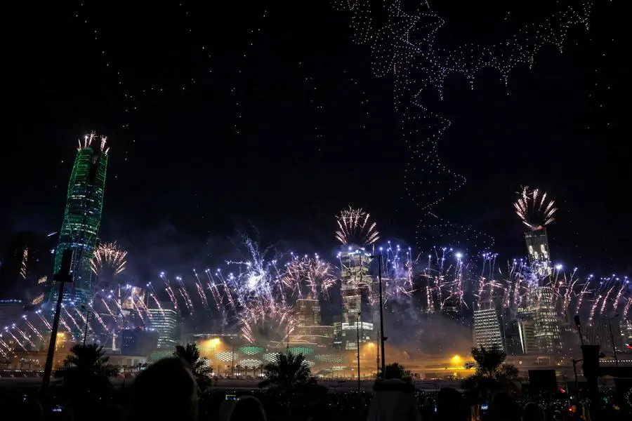 A light display created using drones is performed after Riyadh won the right to host the 2030 World Expo at king Abdullah Financial District in Riyadh, on November 28, 2023. With a pledge for an Expo \\\"built by the world for the world\\\", Saudi's bid smashed the opposition after a years-long lobbying campaign whose intensity caused some gnashing of teeth among its Italian rivals. (Photo by Fayez NURELDINE / AFP)