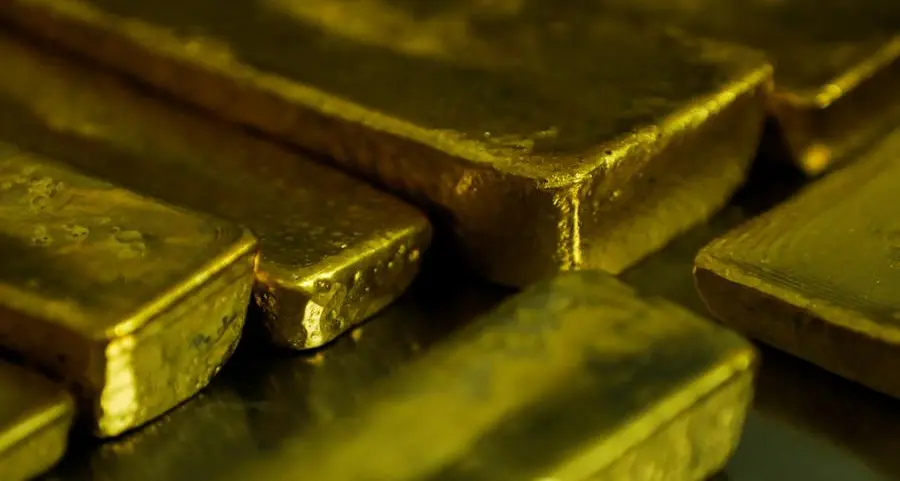 Gold rises as weaker dollar, trade tensions lift safe-haven demand