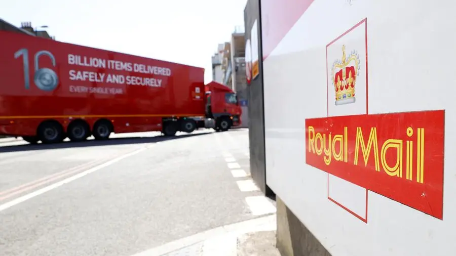 Royal Mail parent IDS posts smaller annual loss on turnaround headway