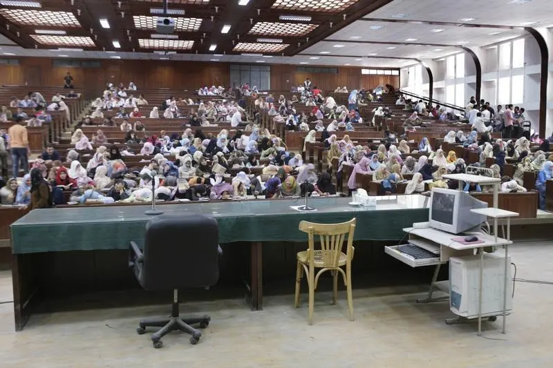 Image used for illustrative purpose. Students wait in a lecture hall at Mansoura University\\'s law school, 210 km (130 miles) north of Cairo, March 23, 2008, during a strike by professors to demand wage increases. , Nasser Nuri 