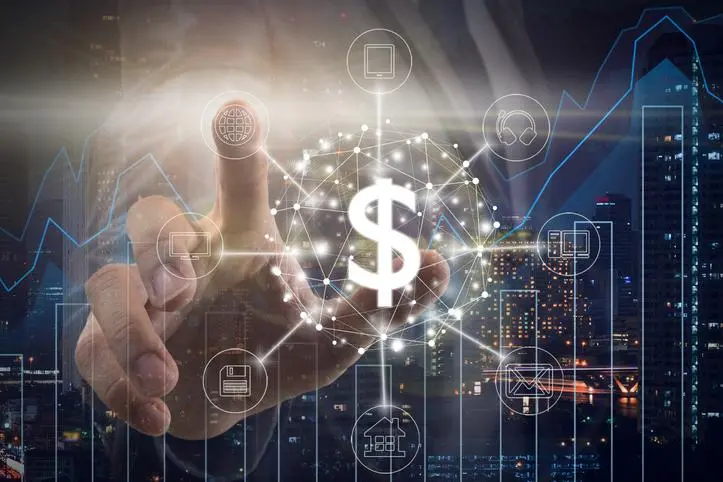 Hand of Businessman touching the global network and dollar currency text financial technology or FINTECH over the Trading graph on the cityscape background, business innovation and technology concept , Getty Images/Getty Images